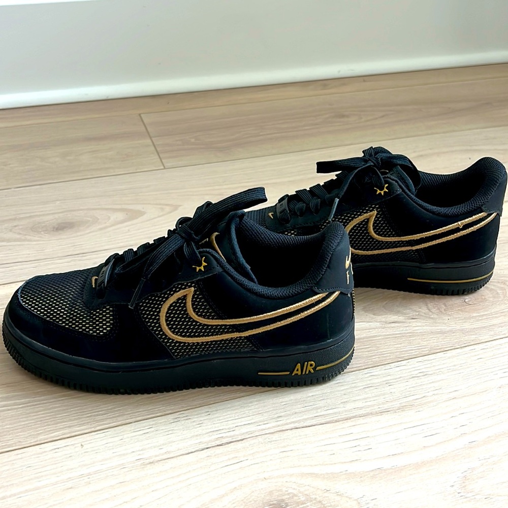 Black and Gold Nike Sneakers